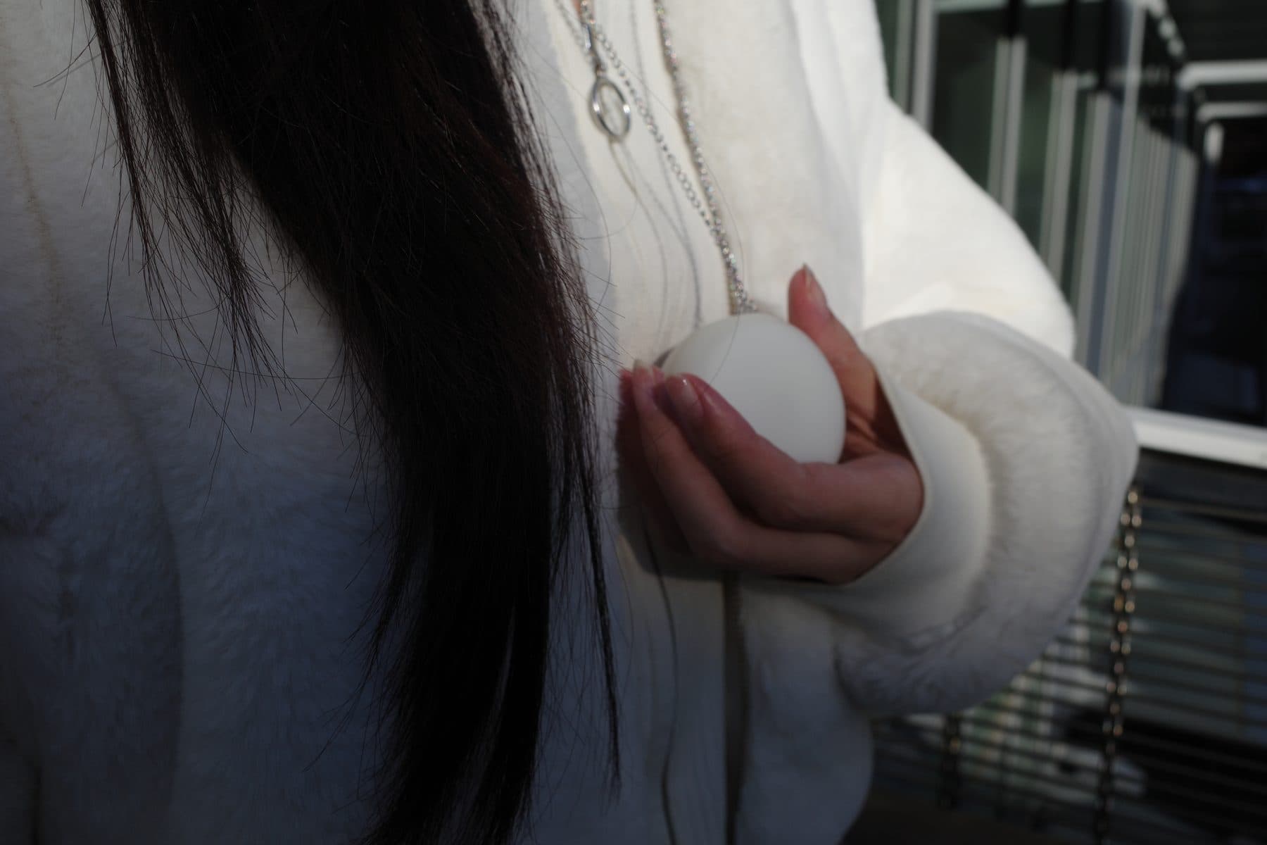Holding Pebbi in the hand